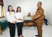 Dihadiri Asisten 1 Pemkab Bolmong,Pj Sangadi Bombanon Lantik 2 Perangkat Desa