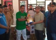 Serahkan Bantuan Warga Terdampak Banjir di Poigar, Bupati Yusra Himbau Warga Waspada Cuaca Ekstrim