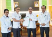 Isnaidin Mamonto Resmi Jabat Plt Kadis PMD Bolmong