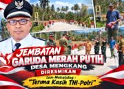 Jembatan Garuda Merah Putih Desa Mengkang diresmikan, Lam Makalalag : Terima Kasih TNI-Polri